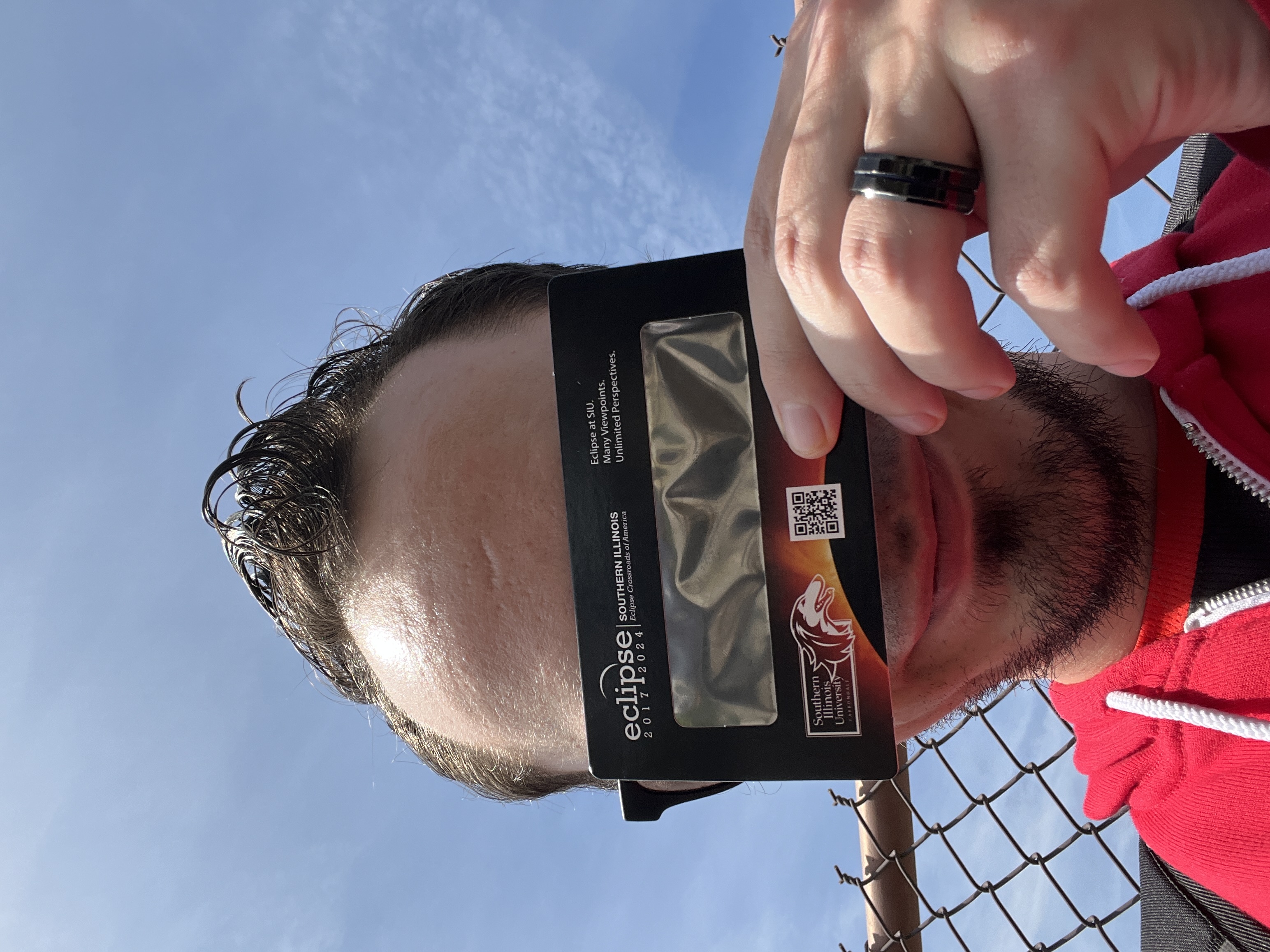 Attending a solar eclipse viewing party.